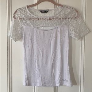 Form fitting white blouse